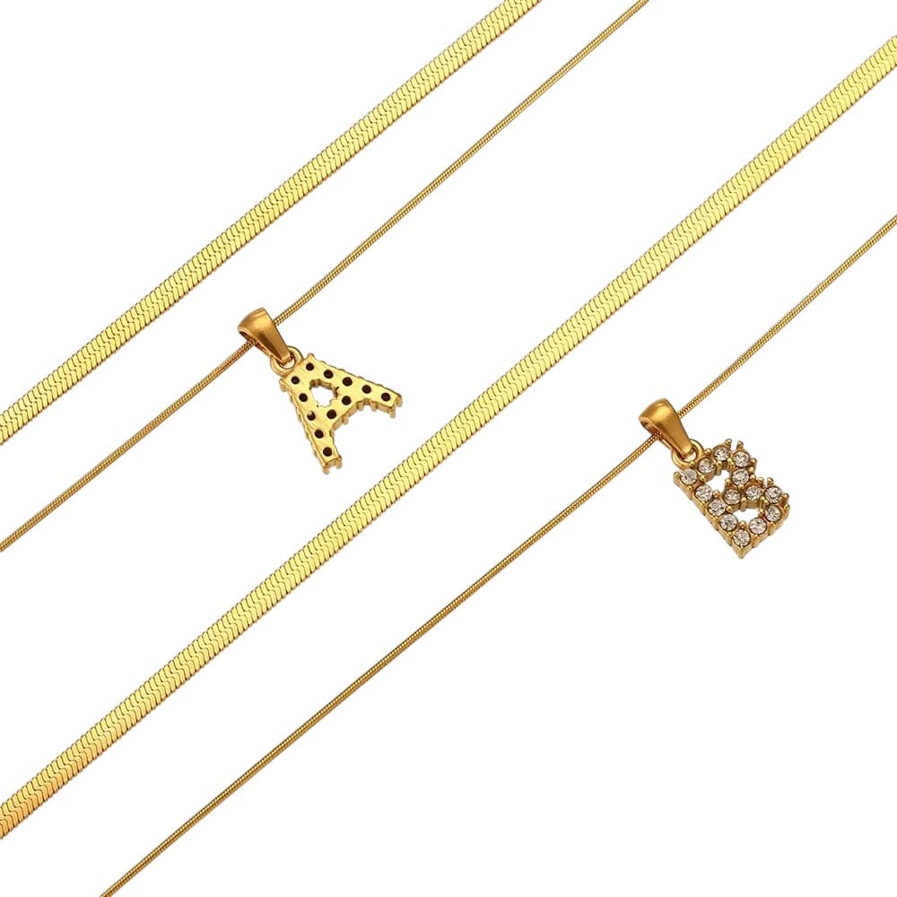 Iniciales de bling de doble cadena